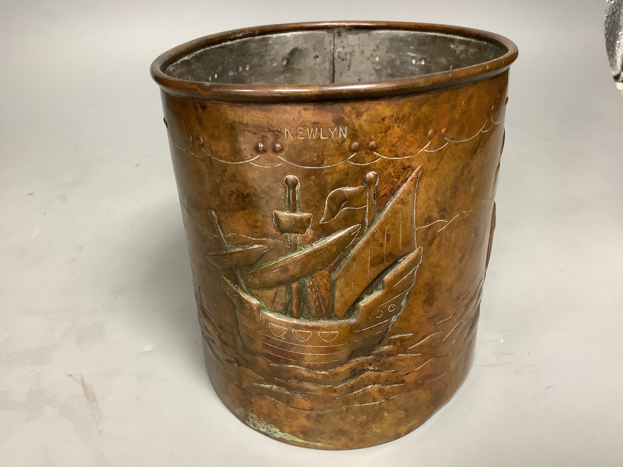 A Newlyn oval copper seascape jar 15cm